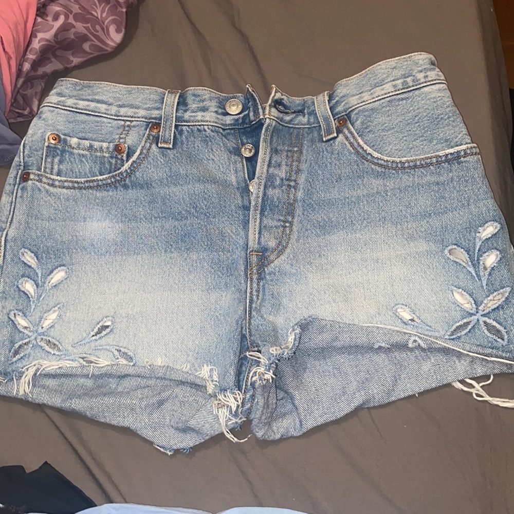 Women’s Levi denim shorts with flower cut outs